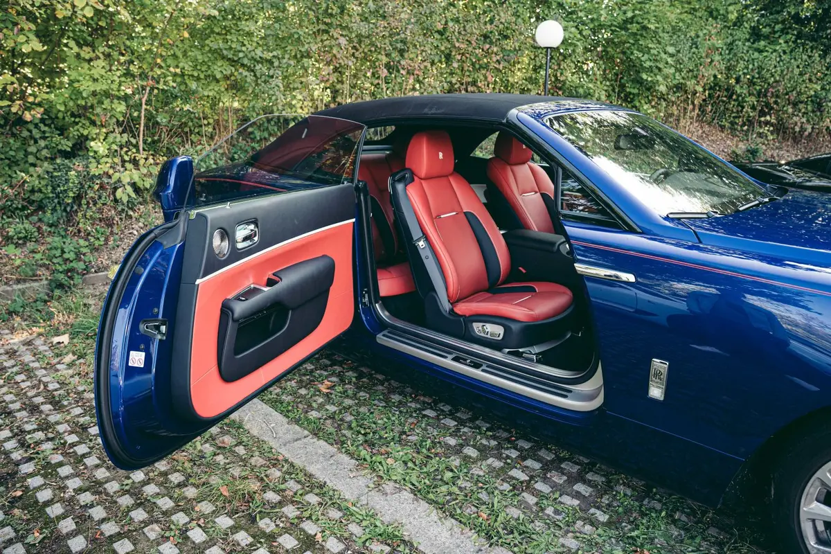 Rolls-Royce Dawn 2022, front view — Cannes Lux Car Rental, Cannes. Top down along the Croisette at sunset