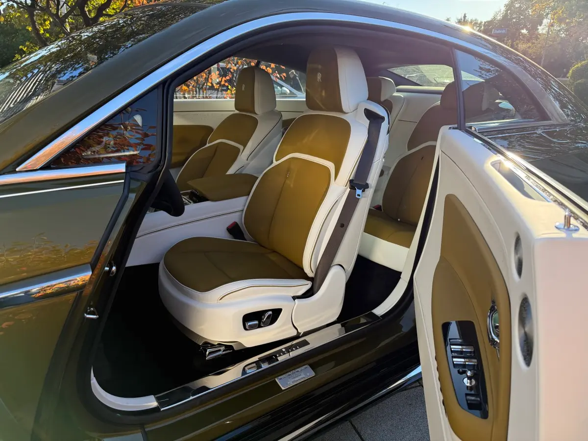 Rolls-Royce Spectre 2024, rear view — Cannes Lux Car Rental, Cannes. Silent glide along the Croisette at sunset